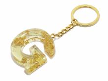 Schl&uuml;sselanh&auml;nger/Taschenanh&auml;nger Gro&szlig;buchstabe G Epoxidharz transparent goldfarbene Zierflocken incl. Schl&uuml;sselring