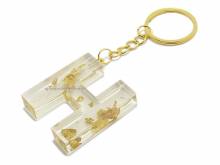 Schl&uuml;sselanh&auml;nger/Taschenanh&auml;nger Gro&szlig;buchstabe H Epoxidharz transparent goldfarbene Zierflocken incl. Schl&uuml;sselring