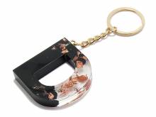 Schl&uuml;sselanh&auml;nger/Taschenanh&auml;nger Gro&szlig;buchstabe D Epoxidharz schw./transparent ros�goldf. Zierflocken Schl&uuml;sselring