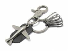 Schlüsselanhänger Flugzeug Metall/Feinsynthetik metallfarben/schwarz matt